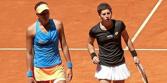 Muguruza-Suárez y Arantxa Parra-Erakovic pasan a cuartos en dobles