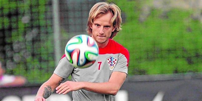 Zubizarreta y Faus viajan para cerrar a Rakitic