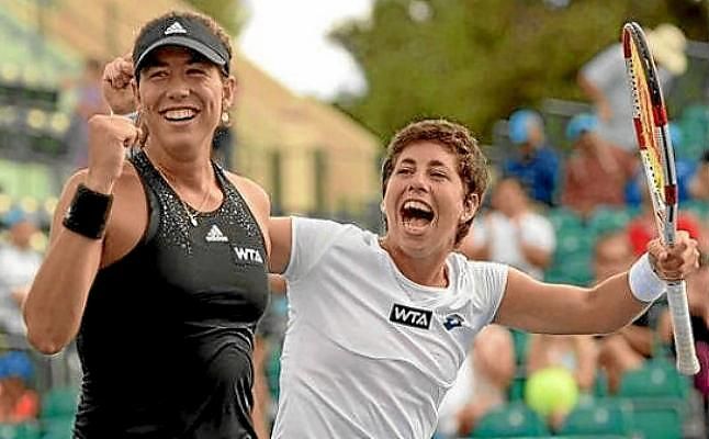 Carla Suárez y Muguruza pasan la primera fase en Australia
