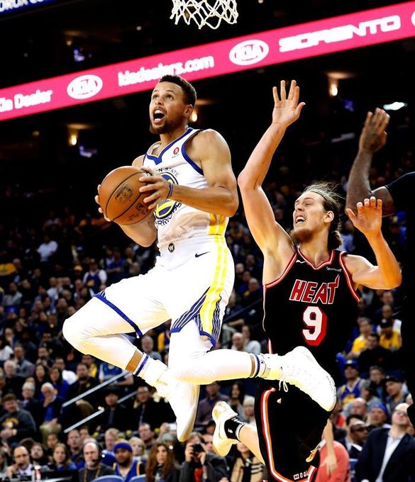 95-123. Curry y Durant se exhibieron ante Heat y Warriors