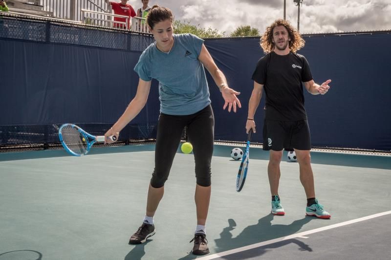 Muguruza y Puyol comparten un entrenamiento previo al inicio del Abierto de Miami