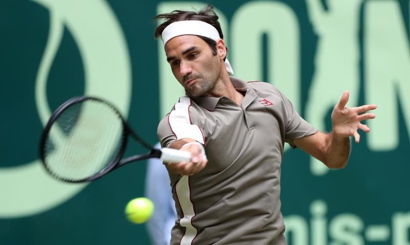 Federer supera a Millman en la primera ronda