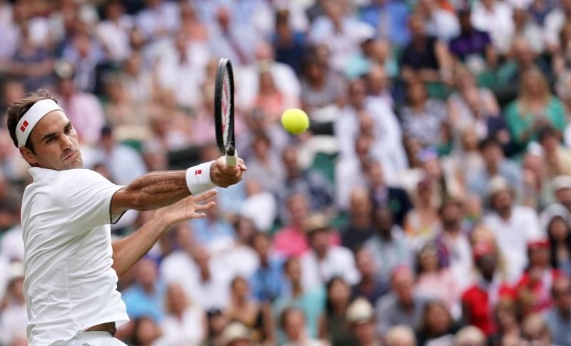 Federer esquiva la trampa de Nishikori y suma 100 victorias en Wimbledon
