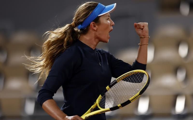 Muguruza, a cuartos de final en dobles