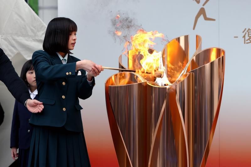 La llama de Tokio 2020 se prepara para un relevo deslucido por la pandemia