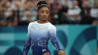 Simone Biles, estafada
