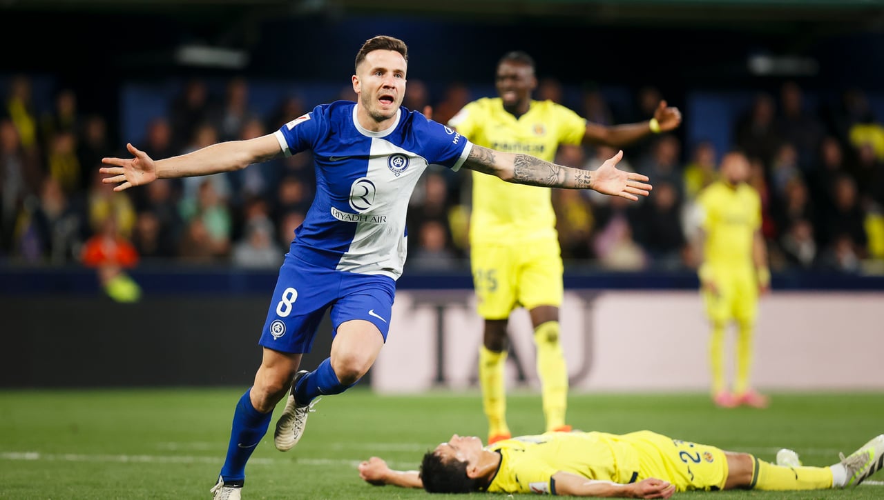 La mirada desafiante de Saúl al banquillo