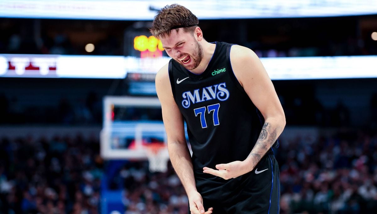 DeRozan levanta la mano y Doncic baja la cabeza